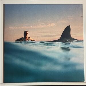 Dua lipa Radical Optimism vinyl with poster and sleeve. The vinyl is clear